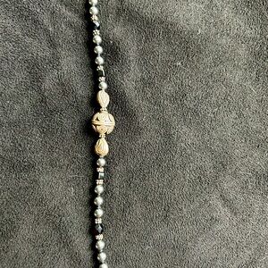 Elegant hemitite & onyx beaded bracelet with silver ball accent 7”
